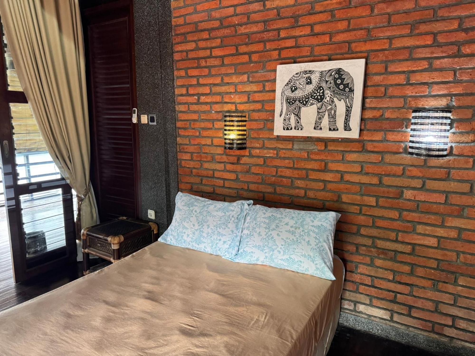 Giri Hill Homestay Нуса-Дуа Экстерьер фото